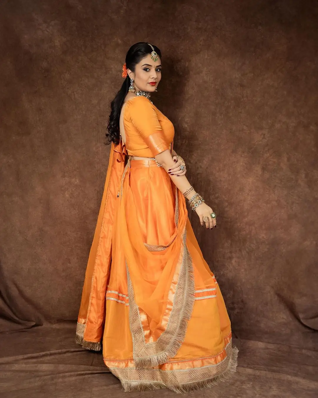 ETV Actress Sreemukhi in Orange Lehenga Blue Choli